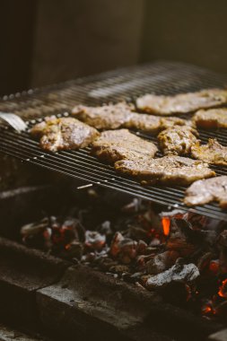 Pork meat chops on barbecue
