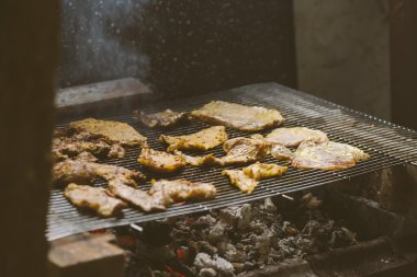 Pork meat chops on barbecue
