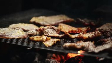 Pork meat chops on barbecue