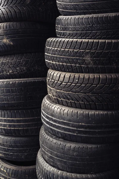 Column stack of old used car tires — Stock Photo, Image