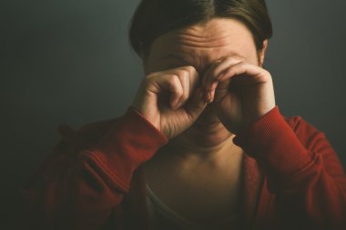Woman crying in despair
