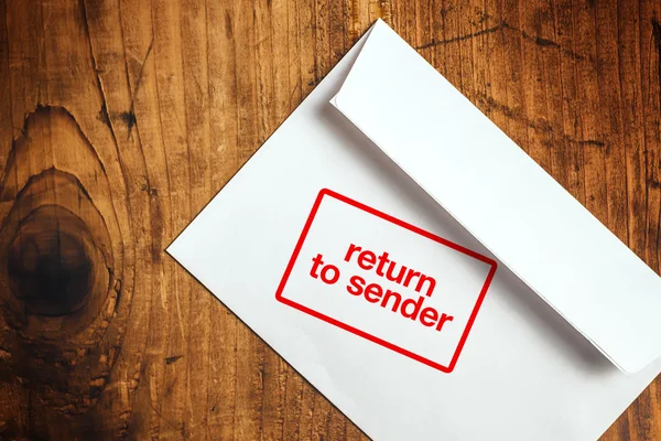 Return to sender stamp on envelope — Stockfoto