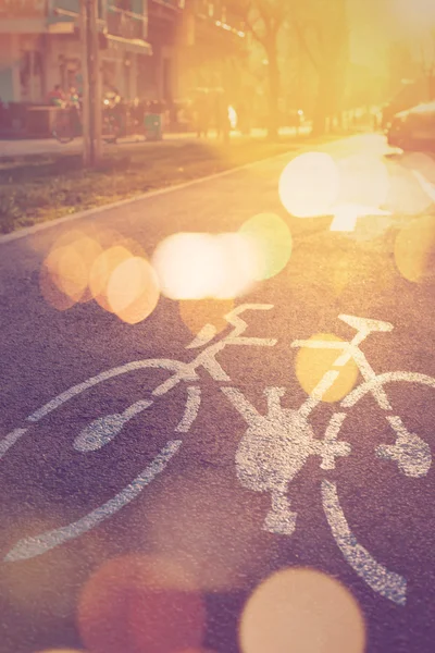 Retro toned bicycle lane mark on the street — Stock Photo, Image