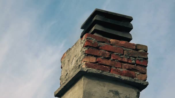 Smoke coming from chimney on house roof top — Stock Video