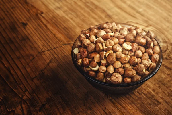 Plenty of ripe hazelnuts in bowl — Stock Photo, Image