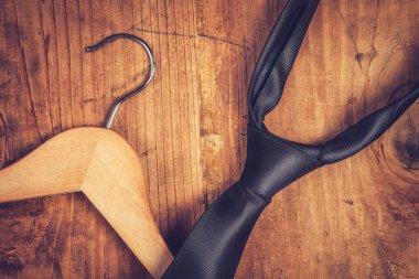 Elegant black tie and cloth hanger