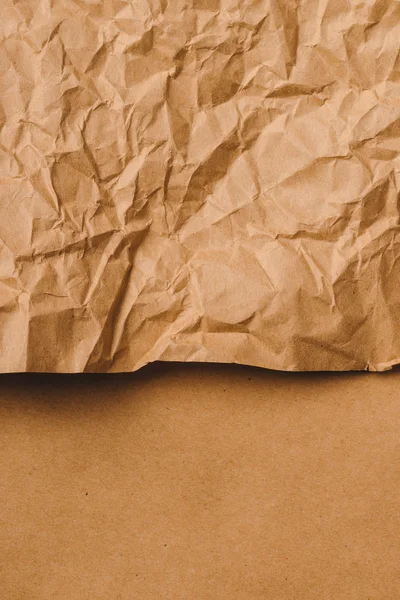 Crumpled brown kraft paper texture — Stock Photo, Image