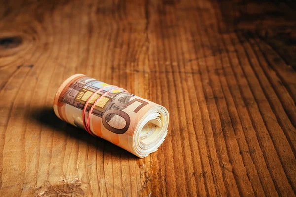 Rolled up cash money, euro banknotes — Stock Photo, Image