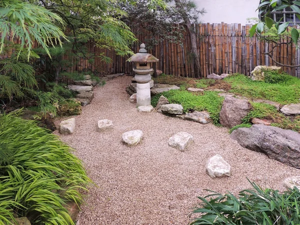 Rocky garden with stone lantern in Japanese style — Stock Photo, Image