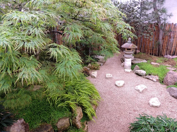 Rocky garden with stone lantern in Japanese style — Stock Photo, Image