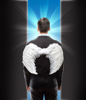 Businessman with wings on his back clipart