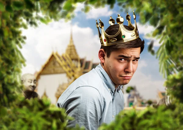 Sad man wearing crown — Stock Photo, Image