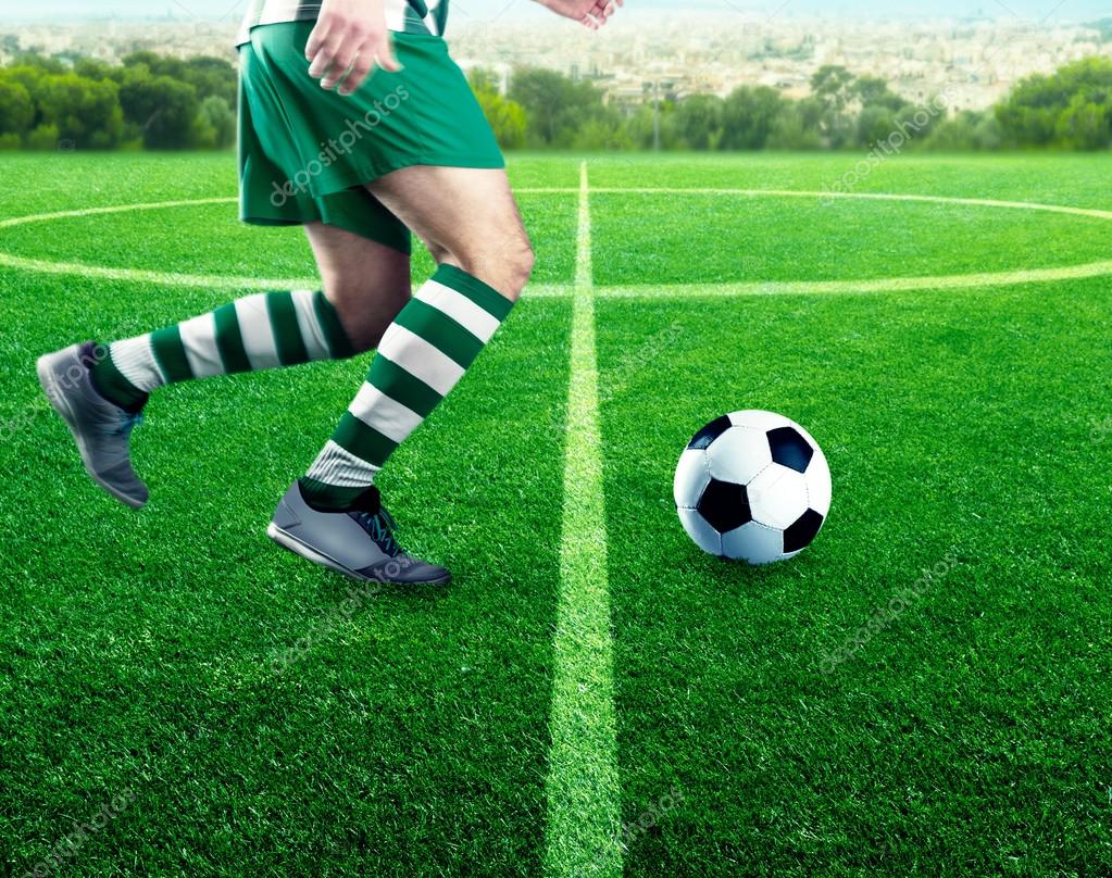 Football player on football ground Stock Photo by ©Nomadsoul1 100566606