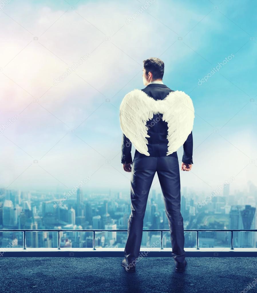 Businessman with angel wings