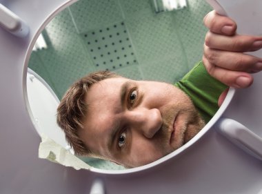 Man ready to  puke in toilet bowl clipart