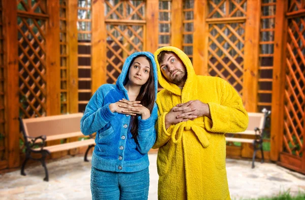 Pensive couple wearing pijamas — Stock Photo, Image