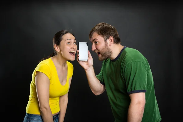 Couple listening to the joke — Stock Photo, Image