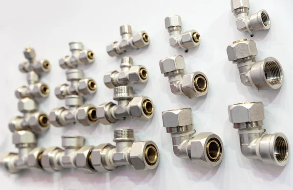 Pipe fittings and fixturing components — Stock Photo, Image