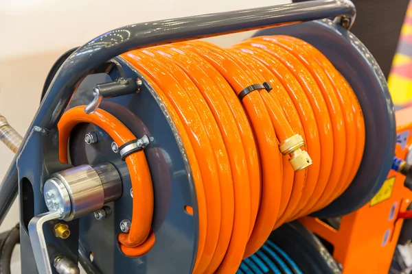 Orange garden hose — Stock Photo, Image