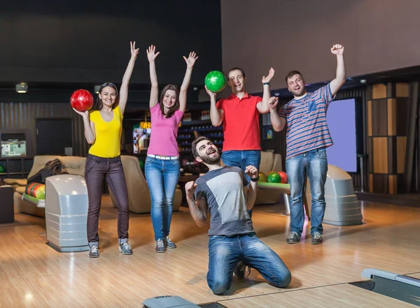 Happy team in bowling — Stock Photo, Image