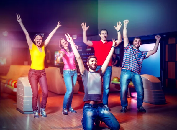 Happy team in bowling — Stock Photo, Image