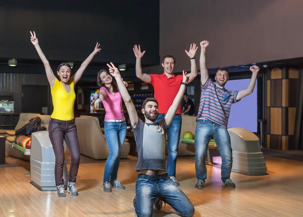 Happy team in bowling — Stock Photo, Image