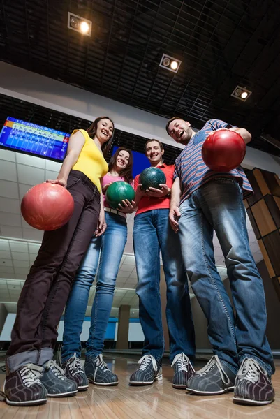 Friends having fun in bowling — Stock Photo, Image