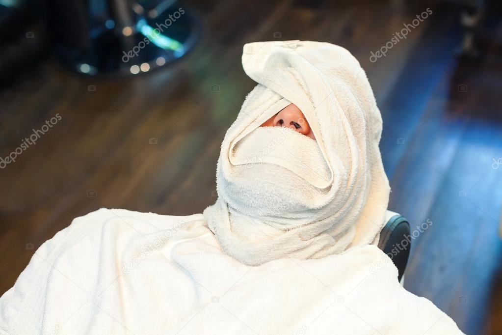 Man twisted in towel
