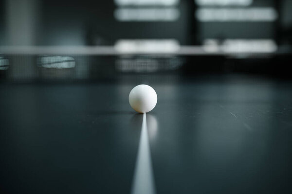 Ping pong ball on white line closeup, nobody