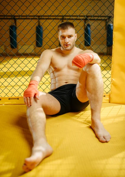 Tired Male Mma Fighter Sitting Floor Cage Gym Muscular Man — Stock Photo, Image