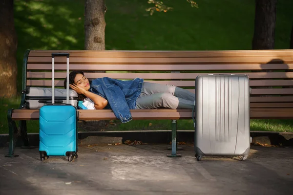 Young Woman Suitcase Sleeping Bench Park Female Traveler Luggage Leisures — Stock Photo, Image