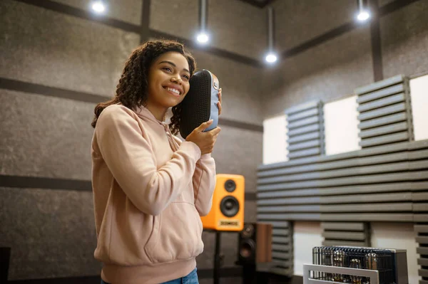 Smiling Woman Holds Sound Speaker Music Store Female Person Audio — Stock Photo, Image
