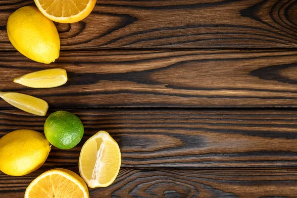 Frische Zitronen Auf Holzgrund Draufsicht Vegetarische Biolebensmittel Lebensmittelsortiment Natürliche Ökoprodukte — Stockfoto