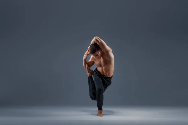 Yoga Doing Stretching Exercise Studio Grey Background Strong Man Practicing — Stock Photo, Image