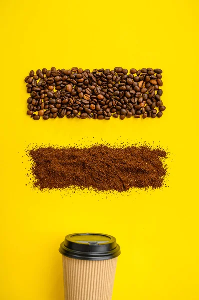 Coffee bean decoration and cup, yellow background — Stock Photo, Image