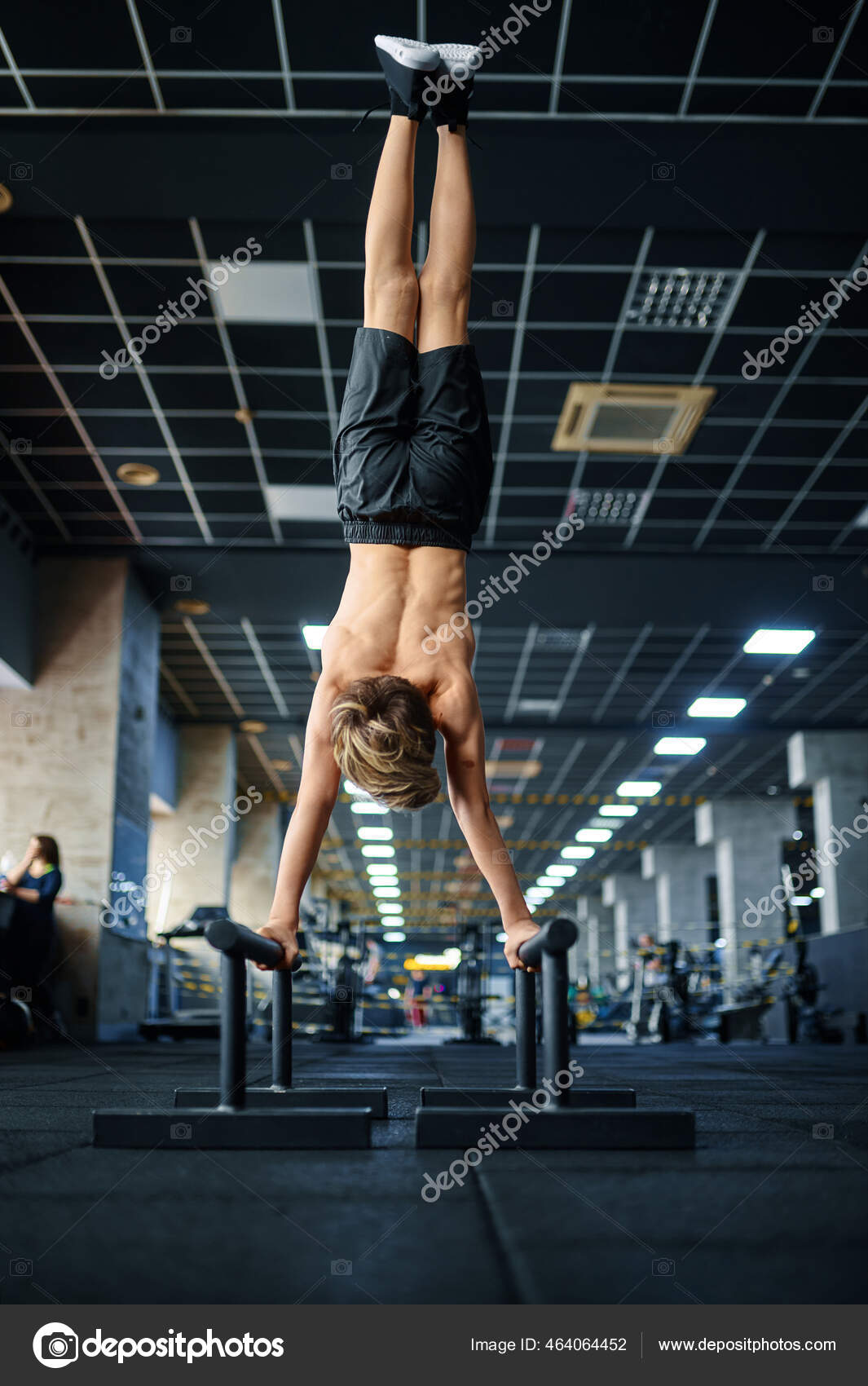 Athletic Boy Doing Exercise Uneven Bars Gym Youngster Training