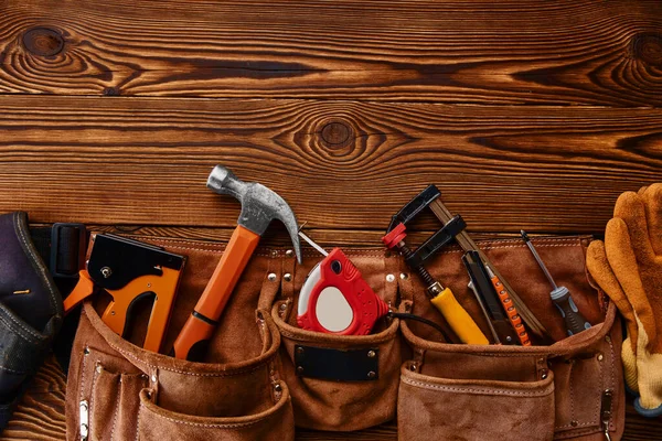 Hammer, stapler, measuring tape and hacksaw — Stock Photo, Image