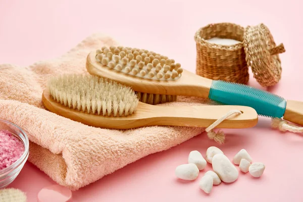 Skin care products, pebbles and towel — Stock Photo, Image