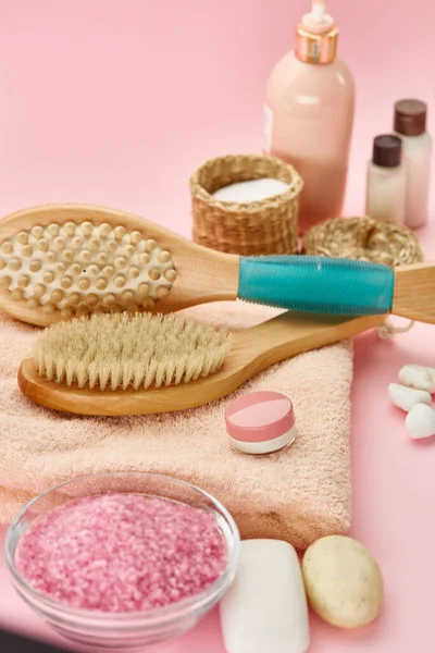 Different skin care products, pink background — Stock Photo, Image