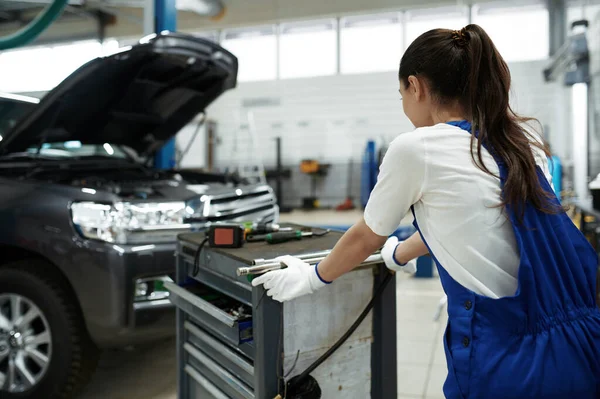 Female Worker Stands Hood Car Service Vehicle Repairing Garage Woman — Stock Photo, Image
