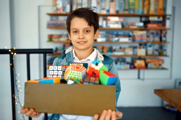 Little Boy Holds Box Different Puzzle Cubes Toy Brain Logical — Stockfoto