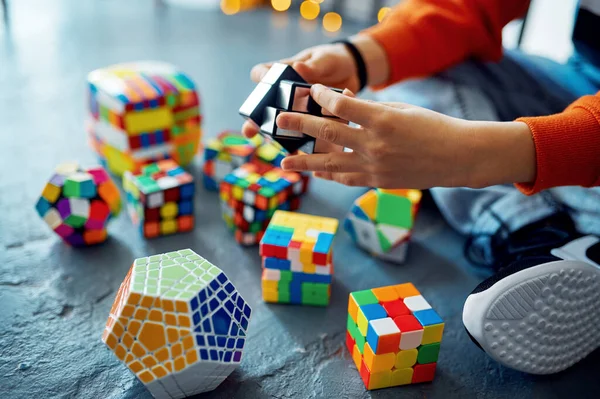 Male Child Trying Solve Different Puzzle Cubes Toy Brain Logical — Foto de Stock