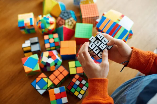 Little Boy Holds Puzzle Cube Numbers Toy Brain Logical Mind — Stock Photo, Image