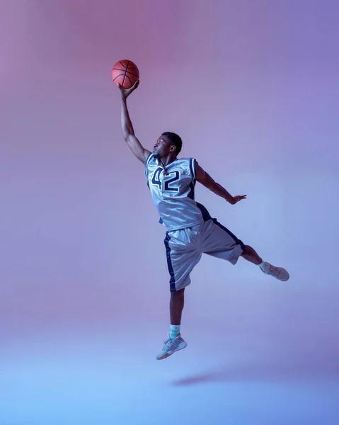 Basketball Player Ball Shows His Skill Studio Jump Action Neon — Stock Photo, Image