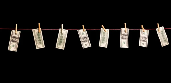 Dollars banknotes hanging on a rope — Stock Photo, Image