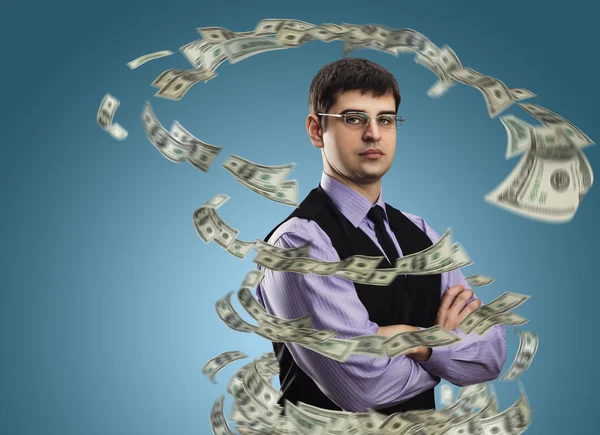 Businessman with money vortex — Stock Photo, Image