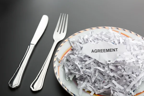 Shredded papers on plate — Stock Photo, Image