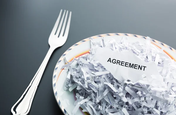 Heap of shredded papers on plate — Stock Photo, Image