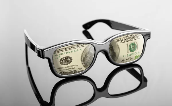 Glasses with dollars instead of lenses — Stock Photo, Image