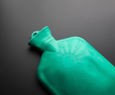 Green rubber hot water bottle clipart